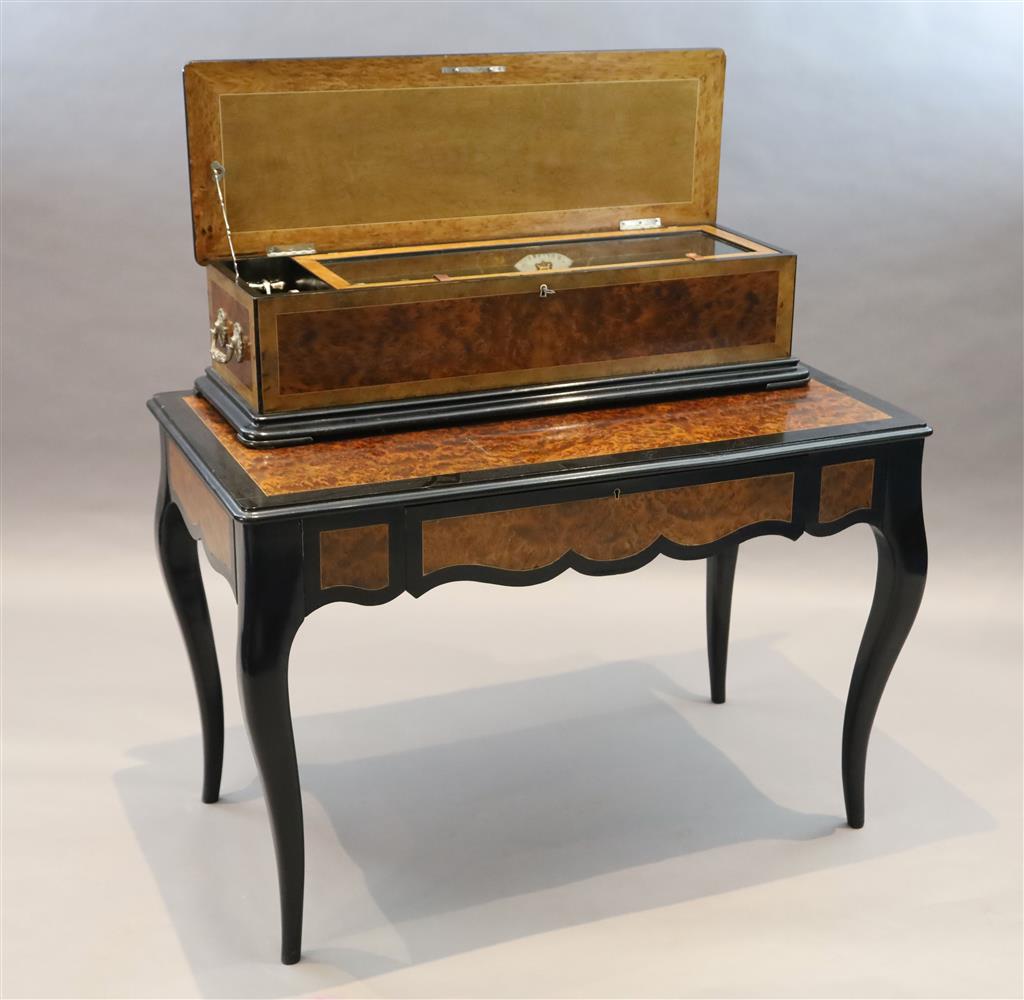 A 19th century Swiss Nicole Freres table musical box, width 44in. depth 24in. height overall 39in.